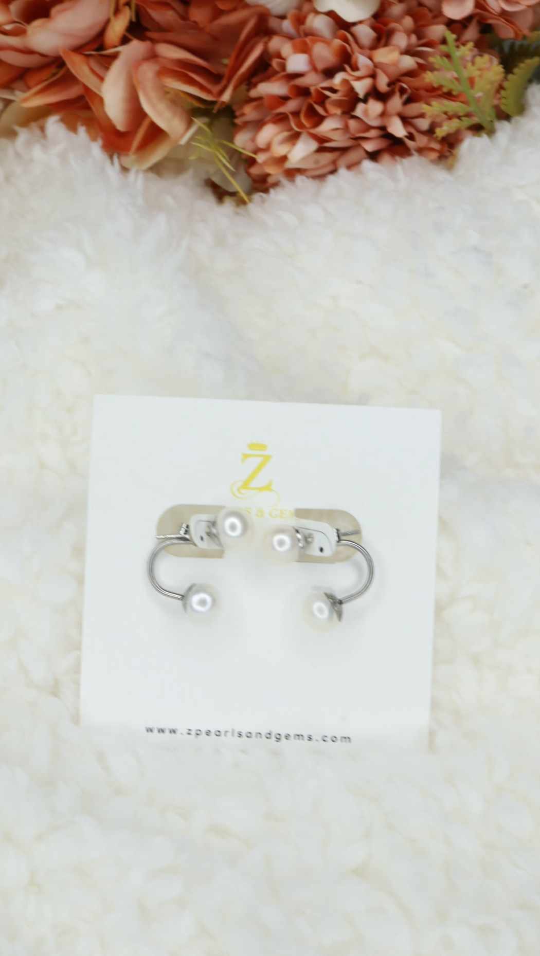 Double pearl stud earrings