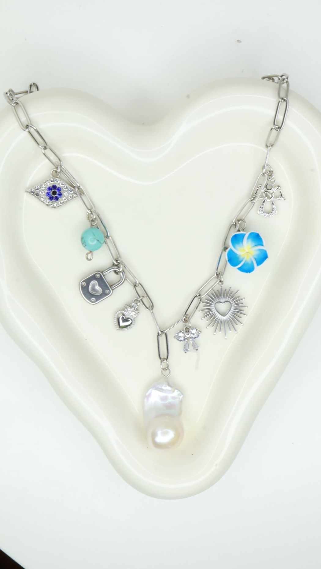 Blue and silver charm necklace with baroque pearl