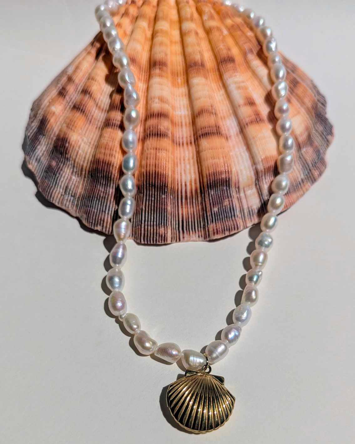 pearl necklace with charm locket pendant